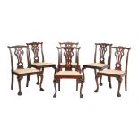 A SET OF SIX LATE VICTORIAN CARVED MAHOGANY DINING CHAIRS
