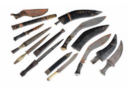 AN ASSORTMENT OF KNIVES AND KUKRIS