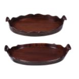 TWO SIMILAR MAHOGANY AND BRASS BOUND TEA TRAYS