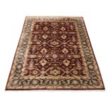 A LARGE AGRA STYLE CARPET