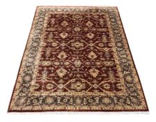 A LARGE AGRA STYLE CARPET