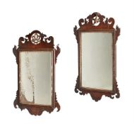 TWO GEORGE II WALNUT AND PARCEL GILT WALL MIRRORS
