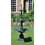 A GREEN PAINTED CAST IRON GARDEN FOUNTAIN