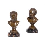 A PAIR OF BRONZE BUSTS OF PUTTI