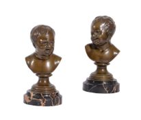 A PAIR OF BRONZE BUSTS OF PUTTI