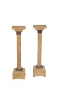 A PAIR OF SIENA MARBLE TORCHERE STANDS