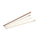 Y FOUR WALKING STICKS AND CANES
