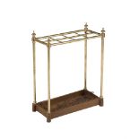 A LATE VICTORIAN BRASS AND CAST IRON STICK STAND