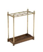 A LATE VICTORIAN BRASS AND CAST IRON STICK STAND