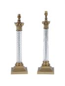 A PAIR OF BRASS AND GILT METAL MOUNTED COLUMNAR TABLE LAMPS