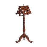 A VICTORIAN CARVED MAHOGANY DUET STAND