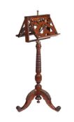 A VICTORIAN CARVED MAHOGANY DUET STAND