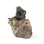 A JAPANESE BRONZE MODEL OF A MONKEY ON A NATURAL ROCK BASE