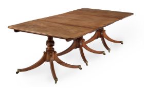 A MAHOGANY TRIPLE PILLAR DINING TABLE, EARLY 19TH CENTURY AND LATER