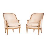 A PAIR OF CARVED GILTWOOD TUB ARMCHAIRS IN LOUIS XVI STYLE