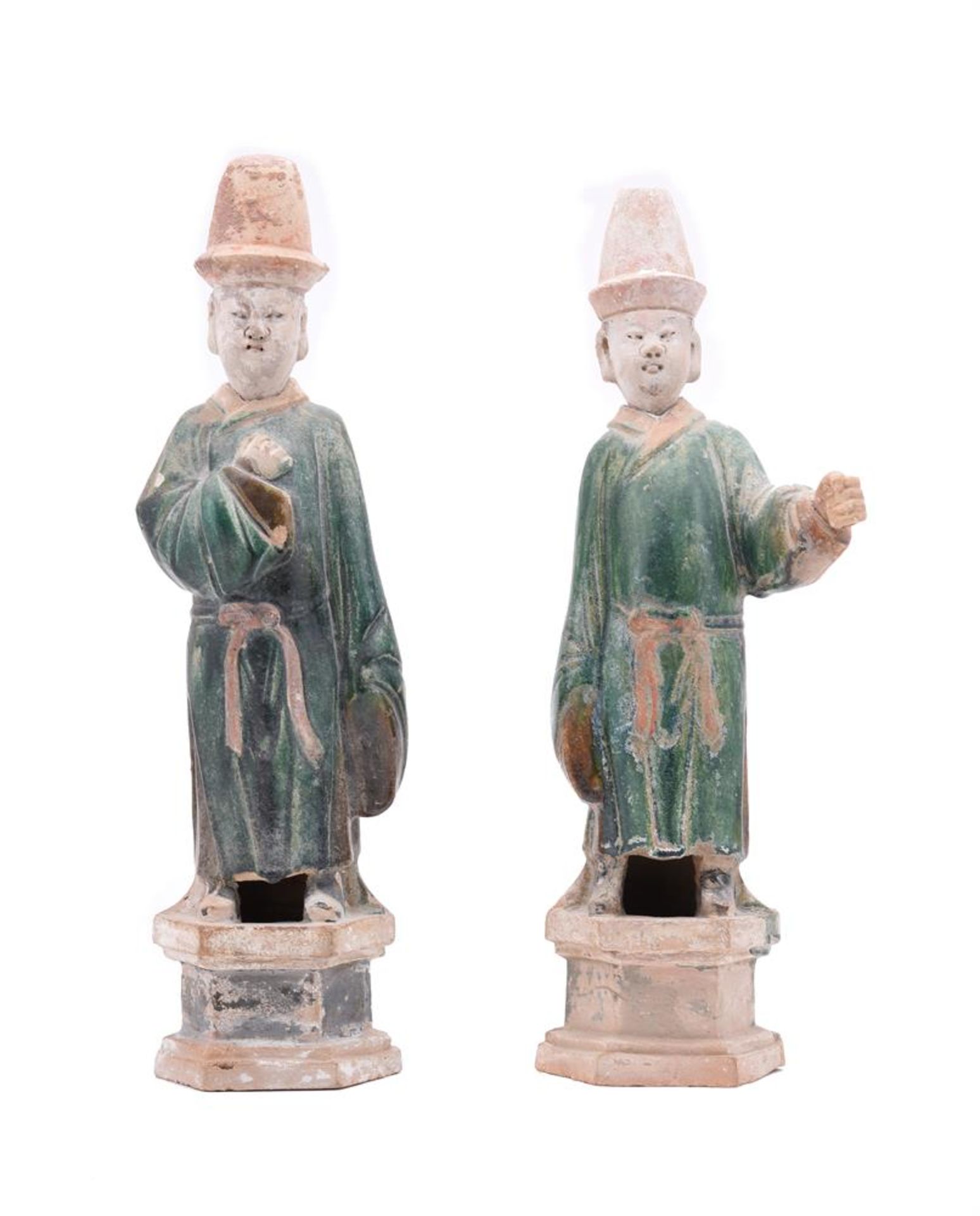 TWO TANG STYLE POTTERY GUARDIAN FIGURES