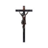 A STAINED WOOD CRUCIFIX