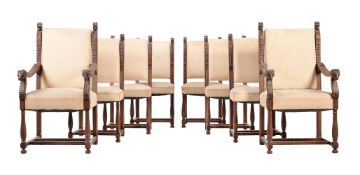 A SET OF EIGHT CARVED OAK DINING CHAIRS IN CONTINENTAL MID 18TH CENTURY STYLE