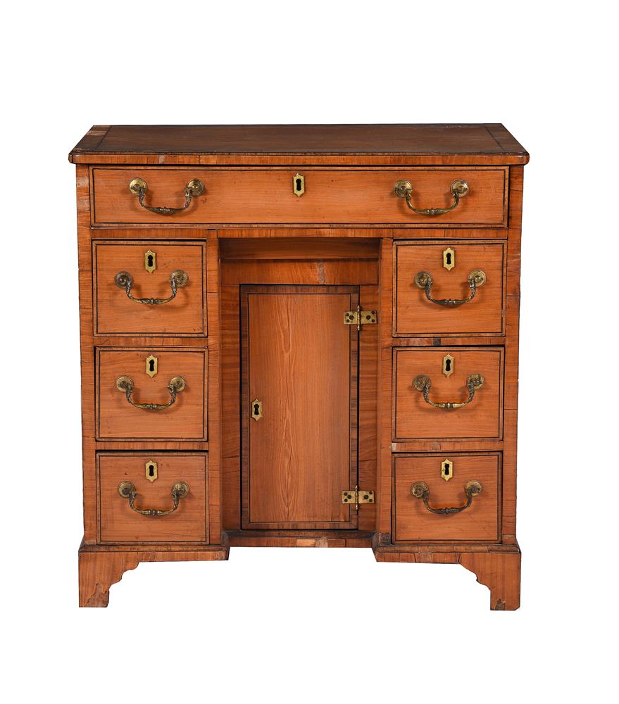 A SATINWOOD KNEEHOLE DESK