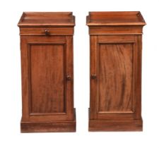 A PAIR OF VICTORIAN MAHOGANY BEDSIDE PEDESTAL CUPBOARDS