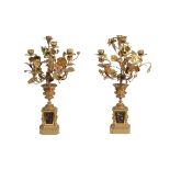 A PAIR OF GILT METAL CANDELABRA