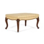 A VICTORIAN WALNUT AND UPHOLSTERED STOOL