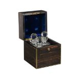 A COROMANDEL AND BRASS STRUNG DECANTER BOX