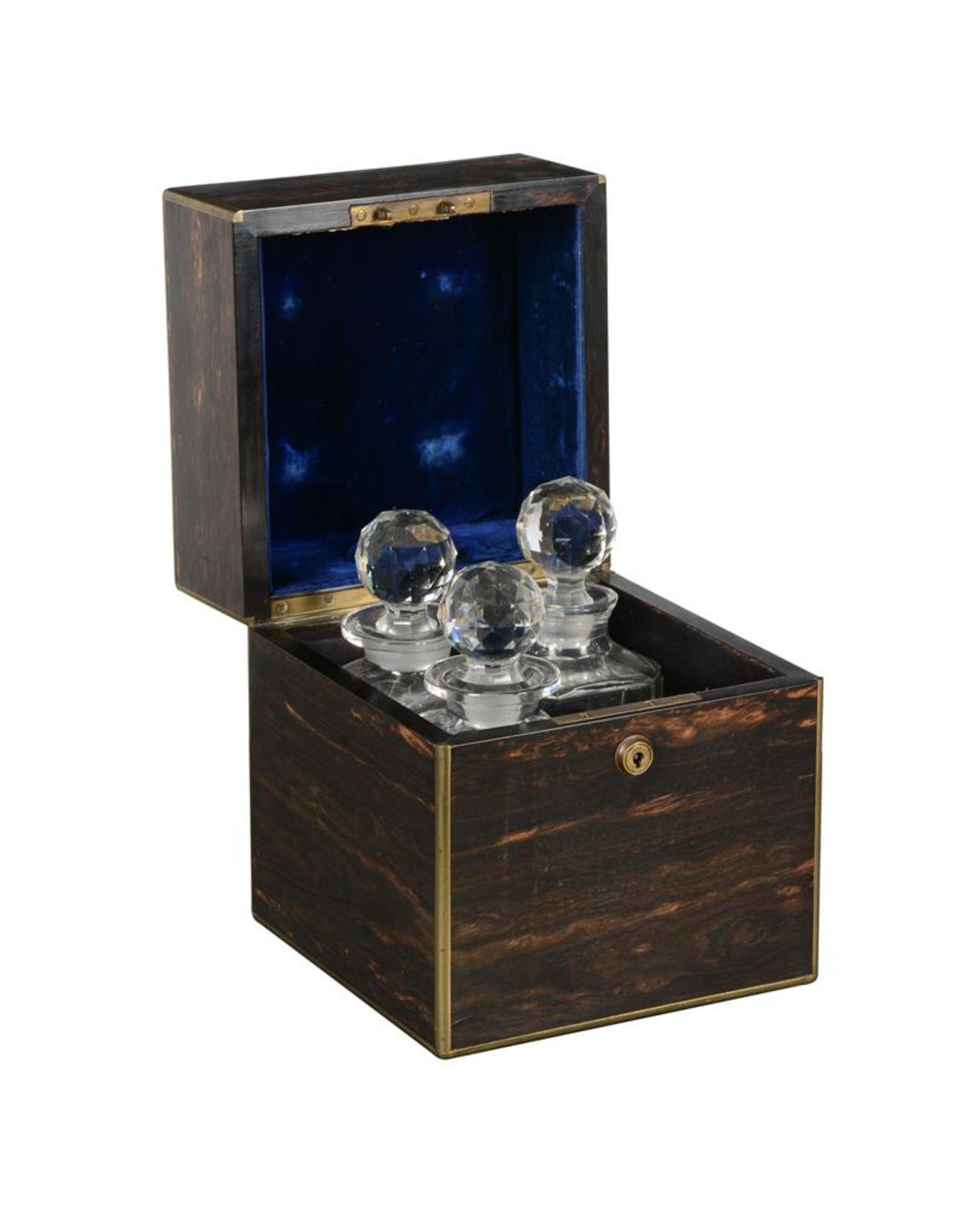 A COROMANDEL AND BRASS STRUNG DECANTER BOX