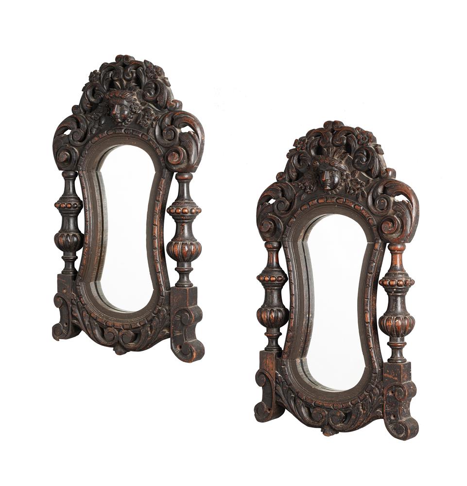 A PAIR OF CARVED OAK WALL MIRRORS IN LATE 17TH CENTURY STYLE