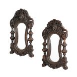 A PAIR OF CARVED OAK WALL MIRRORS IN LATE 17TH CENTURY STYLE