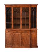 A MAHOGANY BREAKFRONT BOOKCASE IN GEORGE III STYLE