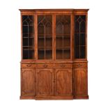 A MAHOGANY BREAKFRONT BOOKCASE IN GEORGE III STYLE