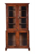 A WALNUT BOOKCASE CABINET