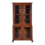 A WALNUT BOOKCASE CABINET