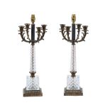 A PAIR OF PATINATED METAL AND GLASS MOUNTED TABLE LAMPS