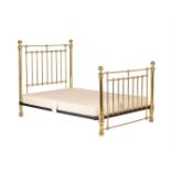 A GILT BRASS BED FRAME IN VICTORIAN STYLE