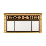 A REGENCY GILTWOOD AND COMPOSITION TRIPTYCH WALL MIRROR