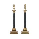 A PAIR OF BRASS AND FOSSILISED MARBLE TABLE LAMPS