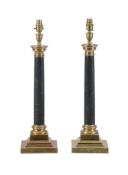 A PAIR OF BRASS AND FOSSILISED MARBLE TABLE LAMPS