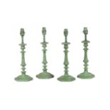 TWO PAIRS OF SIMILAR VERDIGRIS PATINATED METAL CANDLESTICKS