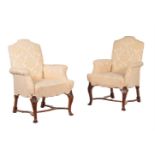 A PAIR OF WALNUT AND UPHOLSTERED ARMCHAIRS IN GEORGE II STYLE