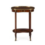 A MAHOGANY AND GILT METAL MOUNTED KIDNEY SHAPED TABLE