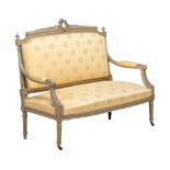 A CARVED AND PAINTED SOFA OR CANAPEIN LOUIS XVI STYLE