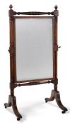 A REGENCY MAHOGANY CHEVAL MIRROR