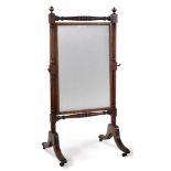 A REGENCY MAHOGANY CHEVAL MIRROR