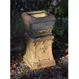 A VICTORIAN TERRACOTTA URN AND PEDESTAL IN THE MANNER OF LIBERTY