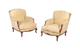 A PAIR OF STAINED WOOD AND UPHOLSTERED YELLOW ARMCHAIRS IN LOUIS XV STYLE