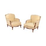 A PAIR OF STAINED WOOD AND UPHOLSTERED YELLOW ARMCHAIRS IN LOUIS XV STYLE