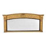 A GEORGE IV GILTWOOD AND COMPOSITION OVERMANTEL WALL MIRROR