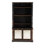 JULIAN CHICHESTER, AN EBONISED AND MIRRORED BOOKCASE IN REGENCY TASTE
